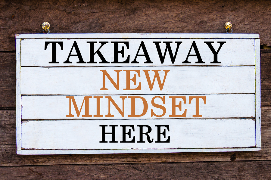 Takeaway New Mindset Here Inspirational message written on vintage wooden board. Motivation concept image